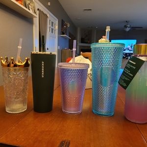 4 Starbucks tumblers and bottle